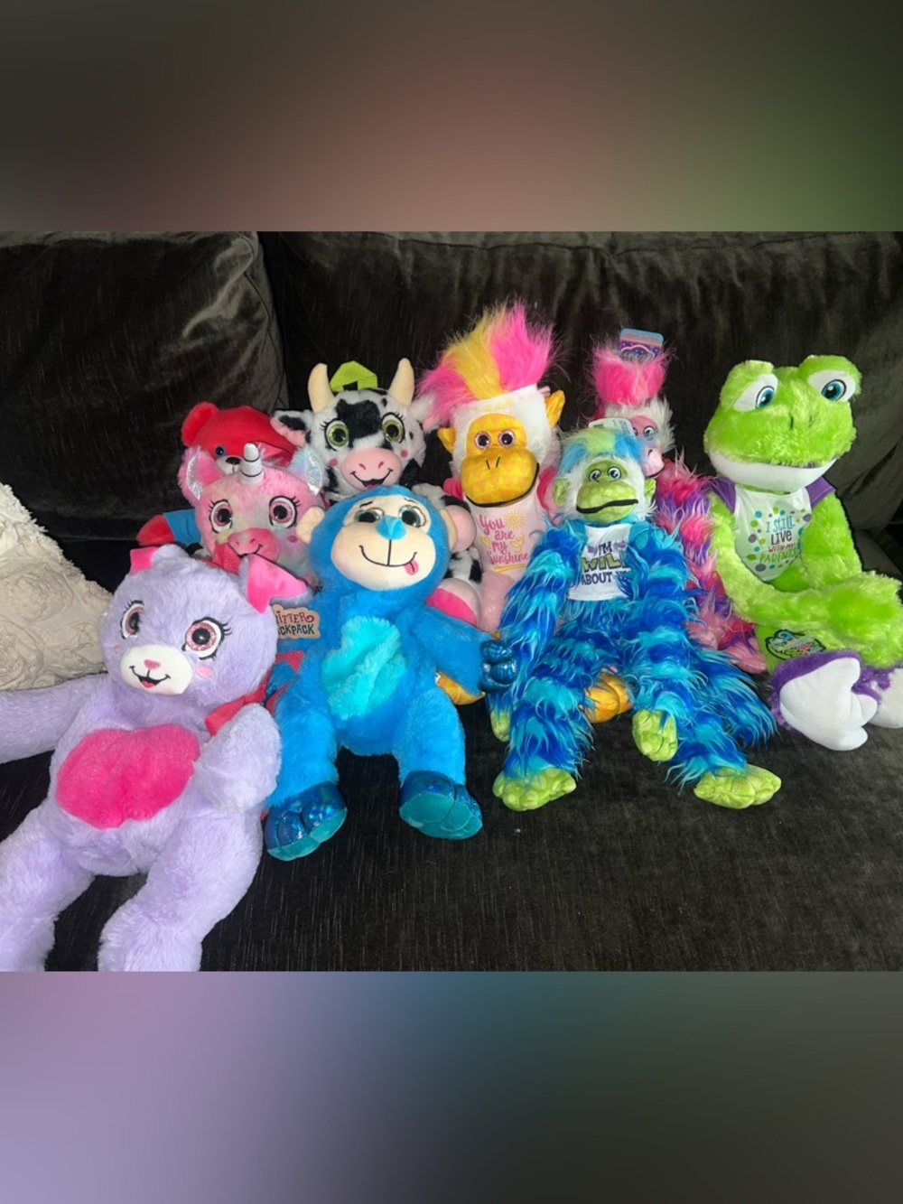 Multicolor Plush Animal Bundle - Blue, Green, Purple, Pink